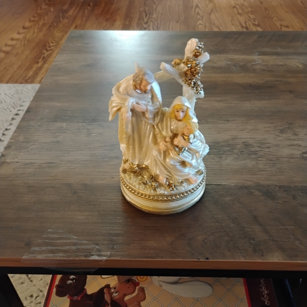 Elegant Cream Musical Nativity Figurine